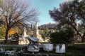 The Accropolis in Athens viewed from the ancient Agora marketplace below with statues and chunks of marble pillars scattered Royalty Free Stock Photo