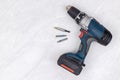 Accu battery hand drill on the white background with copy space