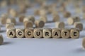 Accurate - cube with letters, sign with wooden cubes