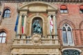 Accursio Palace with statue of Pope Gregory in Bologna, Italy