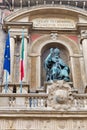 Accursio Palace with statue of Pope Gregory in Bologna, Italy