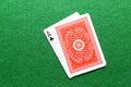 Ace of clubs poker cards on gaming table