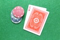 Ace of Diamond poker cards with chips on gaming table