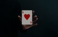 Ace Heart Playing Card. Player or Magician Levitating Poker Card on Hand. Metaphor of Love, Happiness and begin a Good Royalty Free Stock Photo