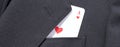 Ace of hearts playing card in business man suit pocket Royalty Free Stock Photo