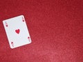 Ace of hearts card on red glitter background Royalty Free Stock Photo