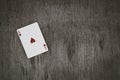 Ace of hearts. playing cards on a wooden background. Risk and Gambling background, abstract and game concept.