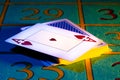 Ace of hearts in playing deck of cards. Playing cards close-up on gaming table in the casino. Stack pasteboard for Royalty Free Stock Photo