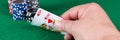 Ace of hearts and red heart king in the hand with poker chips in the background. Panorama