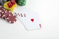 Ace playing cards with red dice. Poker chips on the white background Royalty Free Stock Photo