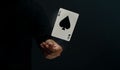 Ace Spade Playing Card. Player or Magician Flick and Levitating Poker Card by Hand. Front View Royalty Free Stock Photo