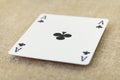 Ace of spades lies on table covered with fabric Royalty Free Stock Photo