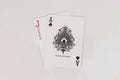 Ace of spades and red joker playing cards on white background Royalty Free Stock Photo