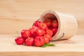 Acerola cherry in wooden bucket on wooden background. Select  focus, Barbados cherry, Malpighia emarginata, high vitamin . Acerola Royalty Free Stock Photo