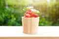 Acerola cherry in wooden bucket on wooden background. Select  focus, Barbados cherry, Malpighia emarginata, high vitamin . Acerola Royalty Free Stock Photo