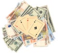 Aces on a heap of money Royalty Free Stock Photo