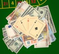 Aces on a heap of money Royalty Free Stock Photo