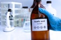 Acetic acid in bottle , chemical in the laboratory and industry