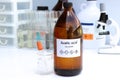 Acetic acid in bottle , chemical in the laboratory and industry