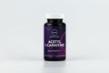 Acetyl L-Carnitine capsules in the jar. dietary supplement editorial photo