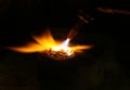 Acetylene torch smelting hot precious metals down