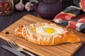 Acharuli Khachapuri. Georgian bread cheese and egg Royalty Free Stock Photo