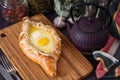 Acharuli Khachapuri. Georgian bread cheese and egg Royalty Free Stock Photo
