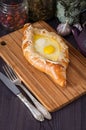 Acharuli Khachapuri. Georgian bread cheese and egg Royalty Free Stock Photo
