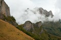 Acheshbok mountain covered by clouds in Autumn, Adygeya, Russia