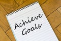 Achieve goals concept on notebook Royalty Free Stock Photo