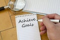 Achieve goals concept on notebook Royalty Free Stock Photo