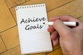 Achieve goals concept on notebook Royalty Free Stock Photo