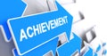 Achievement - Inscription on the Blue Arrow. 3D. Royalty Free Stock Photo