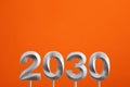 Achievements for the new year 2030 - Silver number on orange foamy