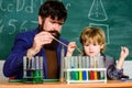 Achieving developmental milestones way before predicted sign that child ready to be challenged. Chemical experiment Royalty Free Stock Photo