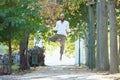 Achieving a state of levitation. Full length portrait of a handsome young man levitating while meditating outside at the Royalty Free Stock Photo