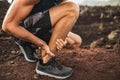 Achilles injury on running outdoors Royalty Free Stock Photo