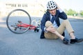 Aching man after bicycle accident Royalty Free Stock Photo