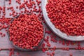 Achiote seed in wooden bowl