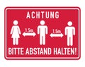 Achtung, bitte Abstand halten. German for Caution, please keep distance Royalty Free Stock Photo