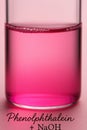 Acid base indicator demonstration with phenolphthalein in alkali Royalty Free Stock Photo