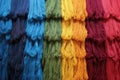 acid dyed wool fibers displayed on canvas