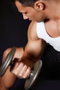 Acing this workout. a handsome young man lifting weights. Royalty Free Stock Photo