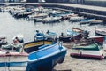 Acitrezza harbor with fisher boats next to Cyclops islands, Catania, Sicily Royalty Free Stock Photo