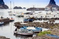 Acitrezza harbor with fisher boats next to Cyclops islands, Catania, Sicily, Italy