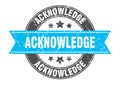 acknowledge round stamp with ribbon. label sign Royalty Free Stock Photo