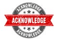 acknowledge round stamp with ribbon. label sign Royalty Free Stock Photo