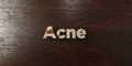 Acne - grungy wooden headline on Maple - 3D rendered royalty free stock image