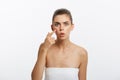 Acne spot pimple spot skincare beauty care girl pressing on skin problem face. Woman with skin blemish isolated, white Royalty Free Stock Photo