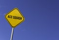 Aco squash - yellow sign with blue sky background